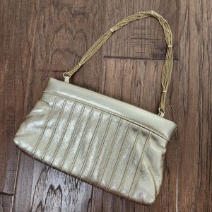 LAUREN MERKIN gold leather clutch